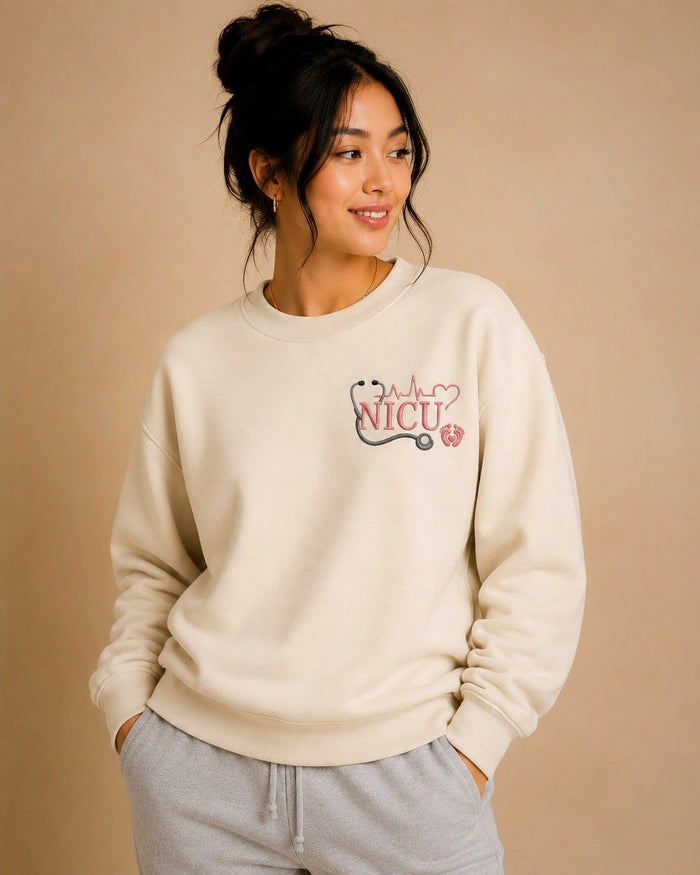 NICU Nurse crewneck worn, embroidered chest design